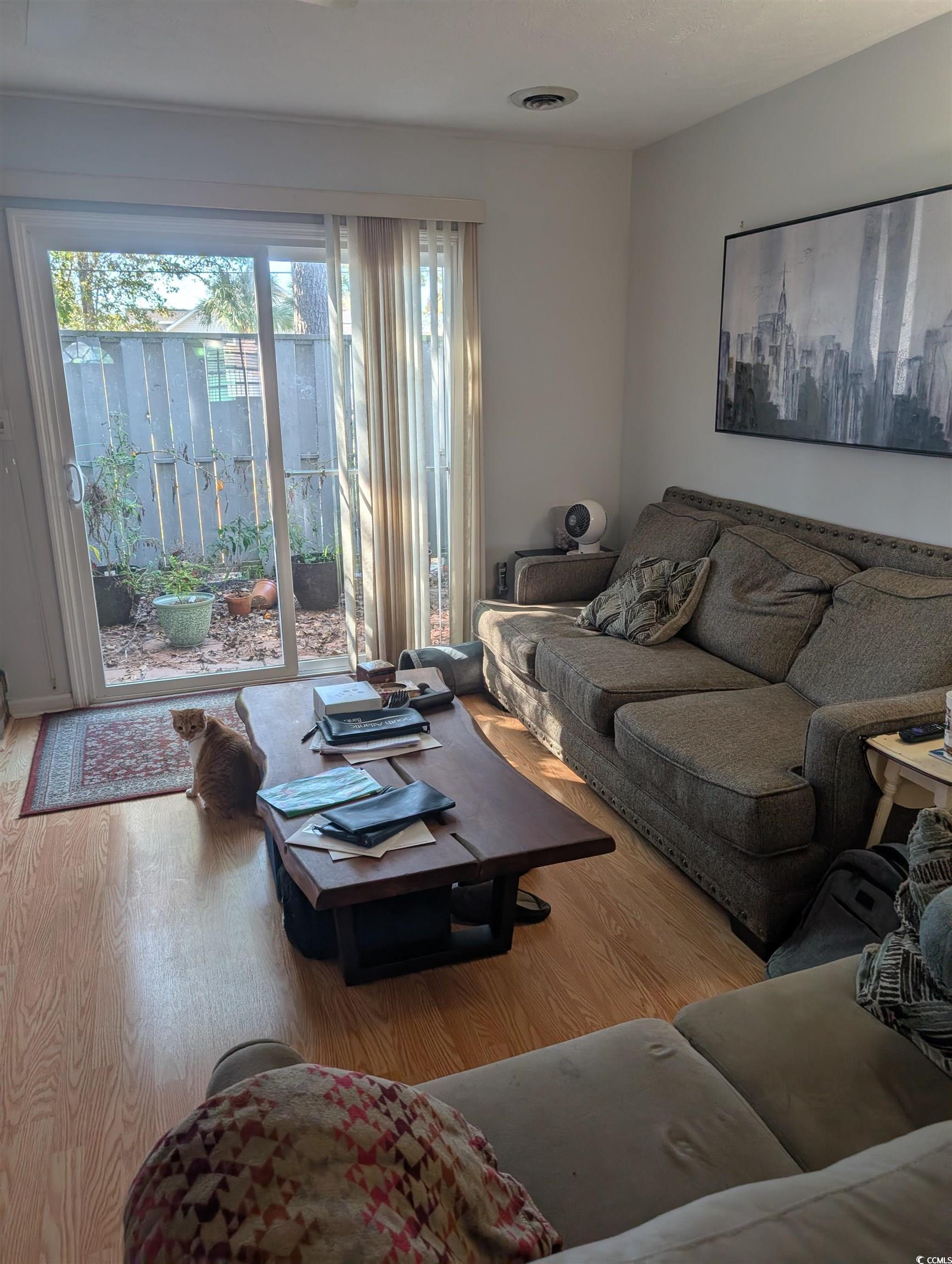 830 North 44th Avenue North, Unit O2 Myrtle Beach, SC 29577 - Photo 2 of 11 Living room with hardwood / wood-style flooring