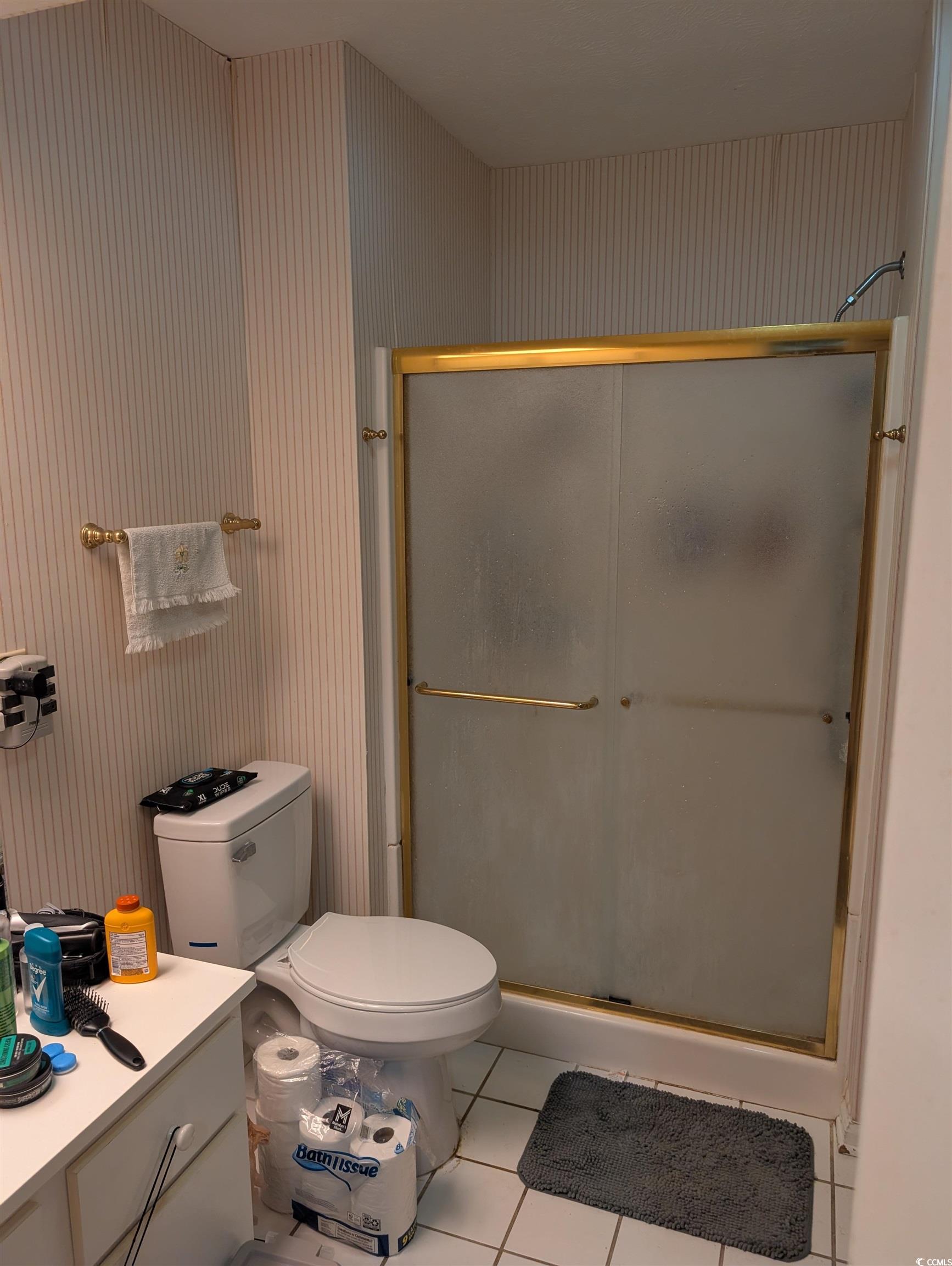 830 North 44th Avenue North, Unit O2 Myrtle Beach, SC 29577 - Photo 8 of 11 Bathroom featuring tile patterned flooring, vanity