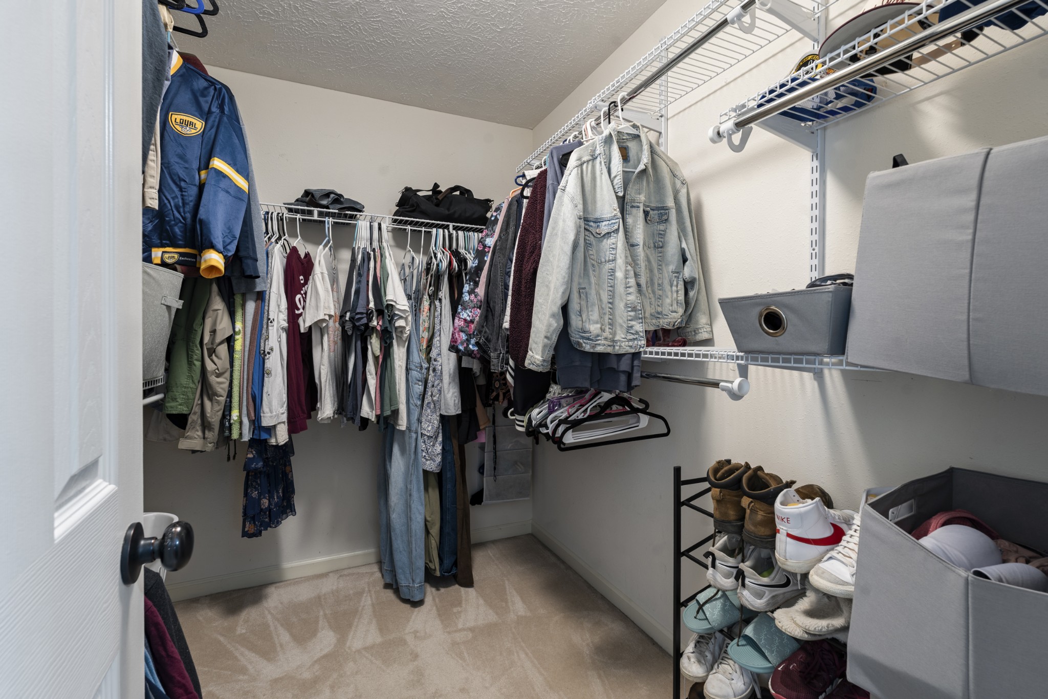 2213 New Port Drive Spring Hill, TN 37174 - Photo 15 of 32 a view of walk in closet with clothes and shoes