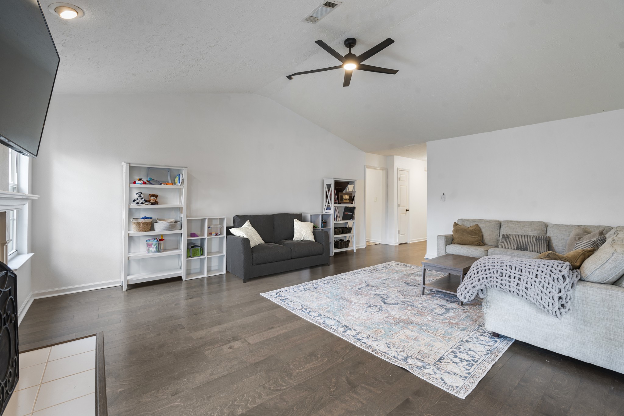 2213 New Port Drive Spring Hill, TN 37174 - Photo 7 of 32 a living room with furniture and a couch