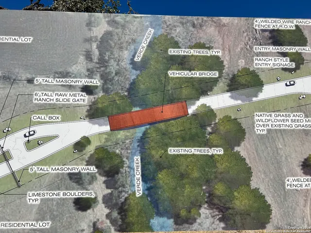 a view of a building with a tree in front of it