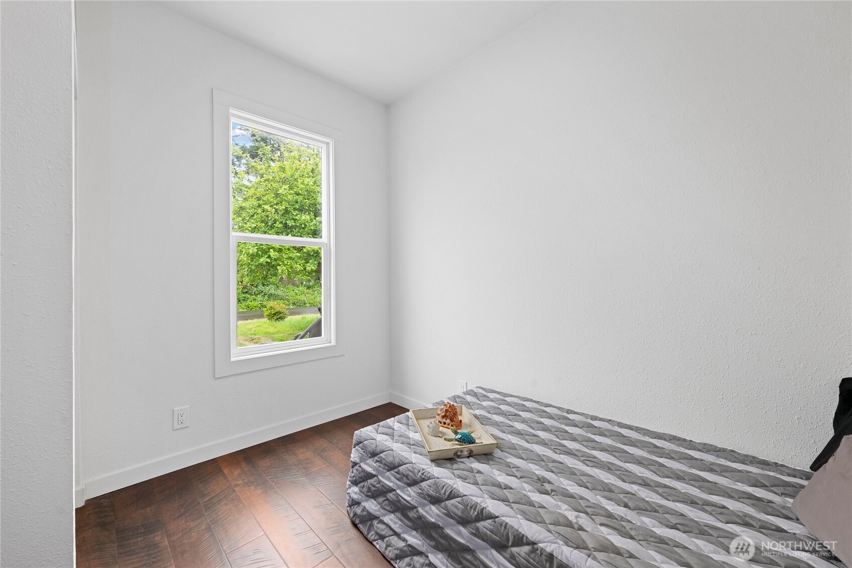 26502 Ridge Avenue Ocean Park, WA 98640 - Photo 8 of 30 a bedroom with a bed and a window
