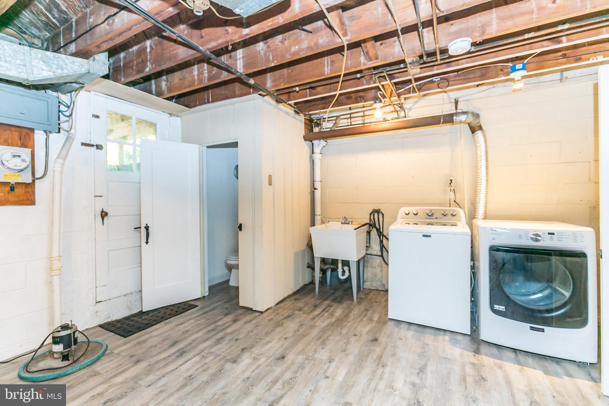 6410 Blenheim Road Baltimore, MD 21212 - Photo 29 of 29 Lower level laundry & storage room with 1/2 bath