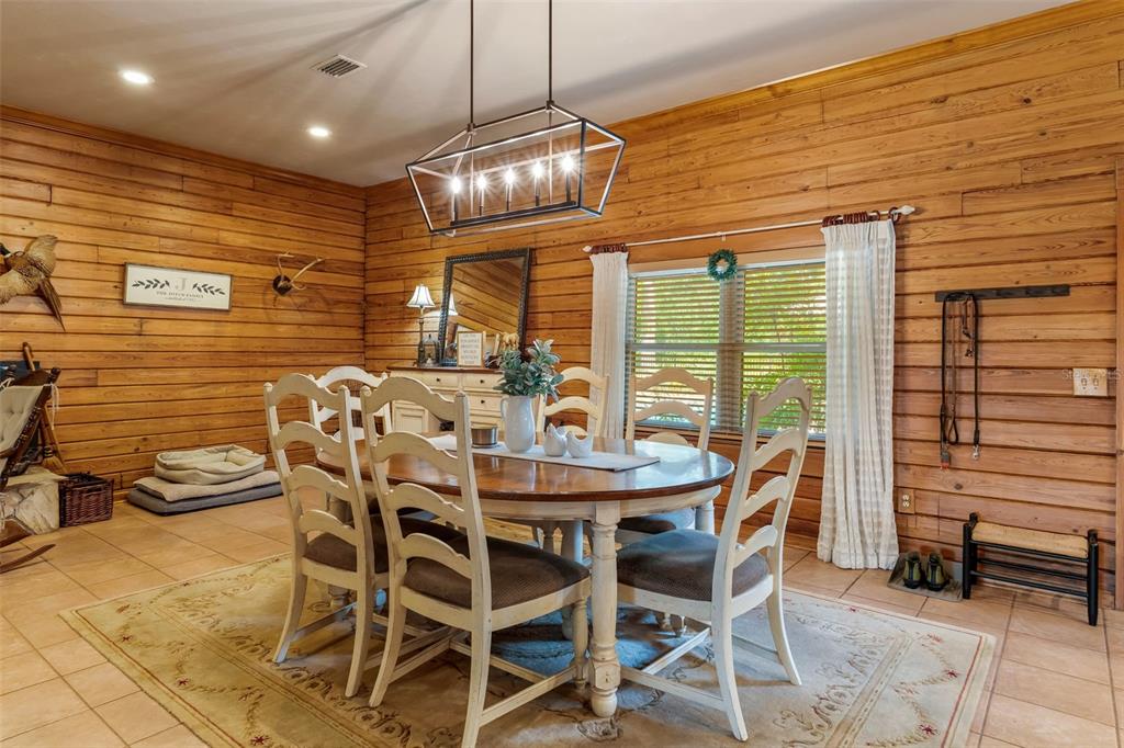 3771 184th Street Wellborn, FL 32094 - Photo 14 of 74 a dining room with furniture and window