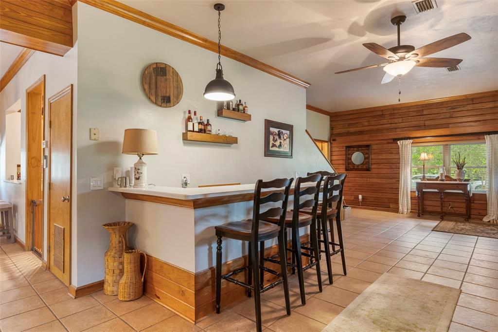 3771 184th Street Wellborn, FL 32094 - Photo 23 of 74 a kitchen with a table and chairs in it