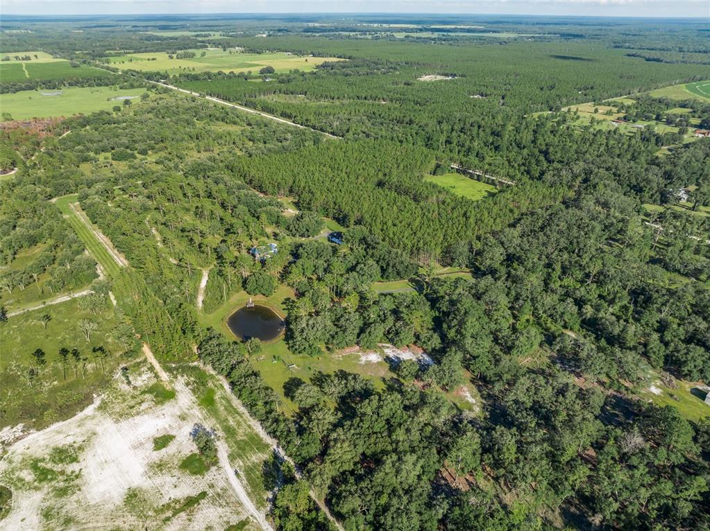 3771 184th Street Wellborn, FL 32094 - Photo 58 of 74 a view of a field with an ocean view