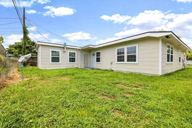 a house view with a garden space