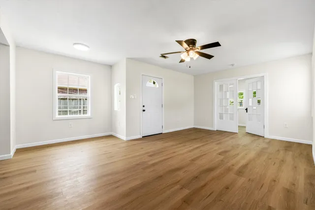 a view of an empty room with a window