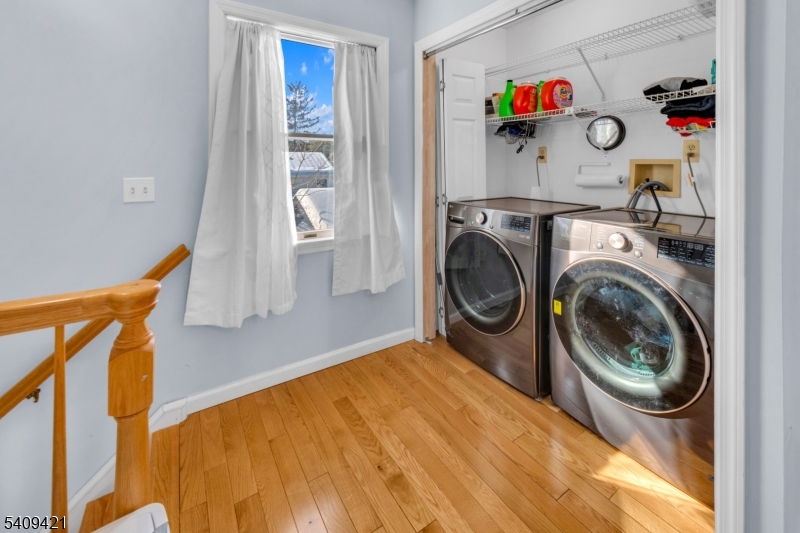 20 Center Street Butler, NJ 07405 - Photo 17 of 17 a utility room with dryer and washer