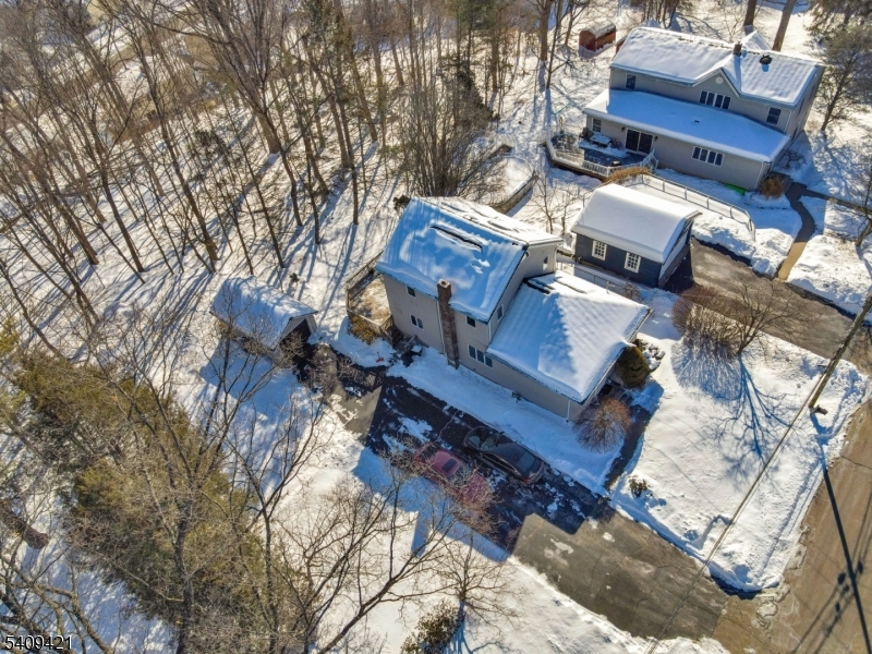 20 Center Street Butler, NJ 07405 - Photo 4 of 17 a view of a house with a yard