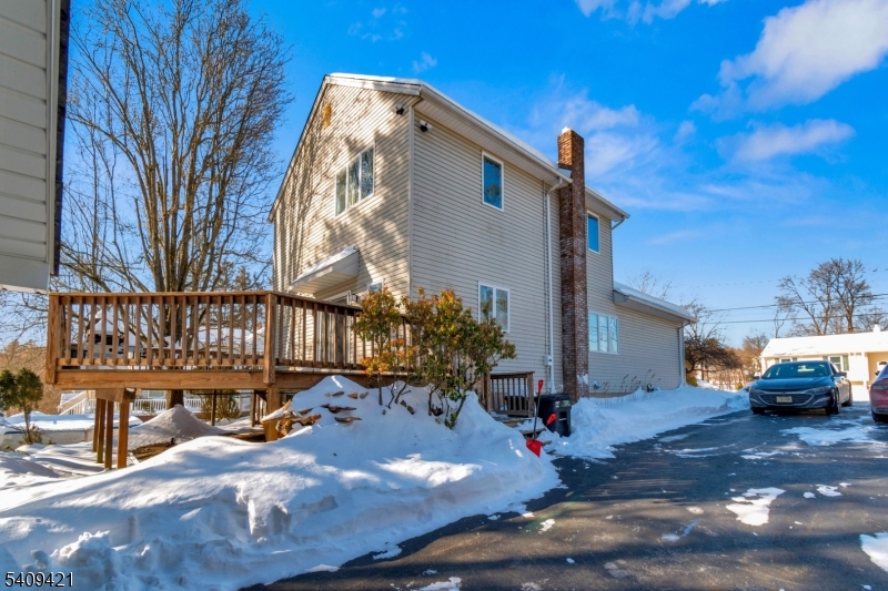 20 Center Street Butler, NJ 07405 - Photo 6 of 17 a view of a house with wooden fence