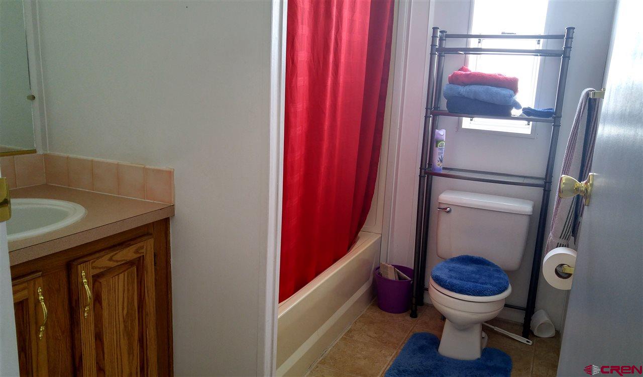 Undisclosed Address Cedaredge, CO 81413 - Photo 11 of 18 This is the main bath in the house, located between bedrooms 2 & 3 .