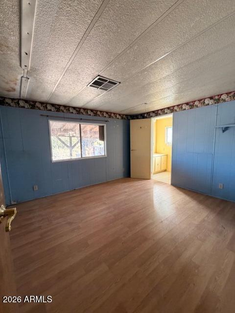 1144 West Edwards Lane Benson, AZ 85602 - Photo 13 of 30 a view of an empty room with a window
