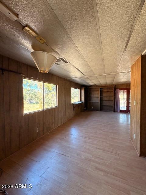 1144 West Edwards Lane Benson, AZ 85602 - Photo 8 of 30 a view of an empty room with a window