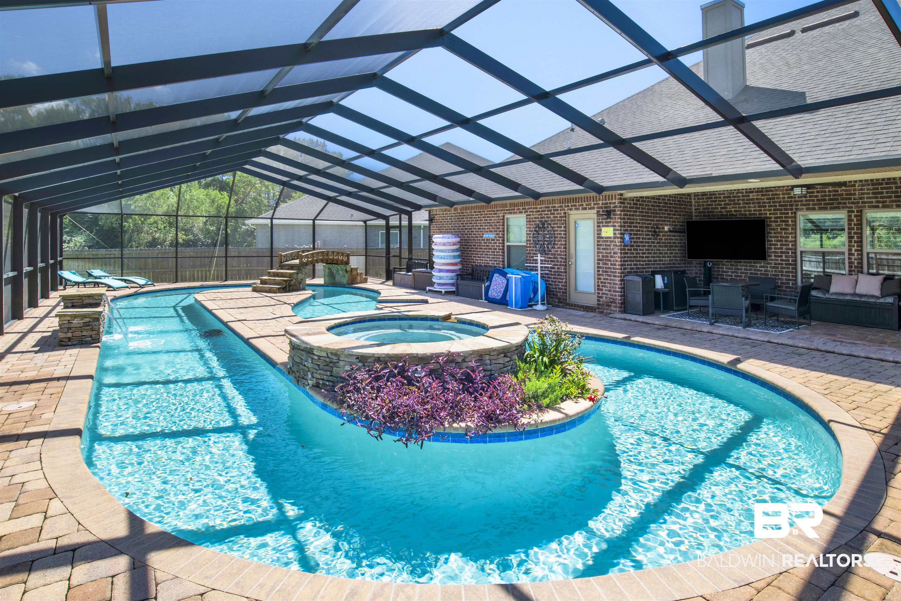 4196 Inverness Circle Gulf Shores, AL 36542 - Photo 36 of 43 View of swimming pool with glass enclosure, a patio, and an in ground hot tub