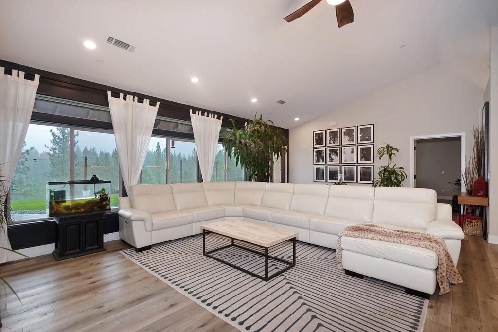 3960 Fort Jim Road Placerville, CA 95667 - Photo 14 of 64 a living room with furniture and a floor to ceiling window