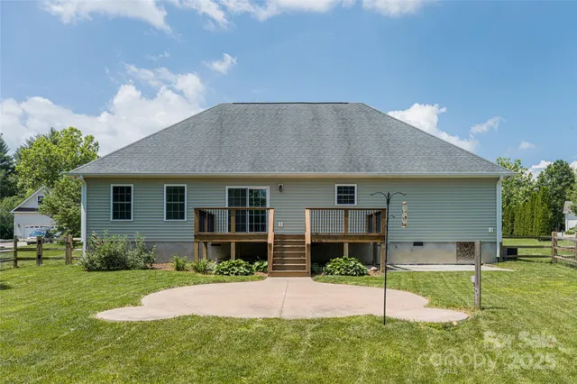 a front view of a house with a yard and porch