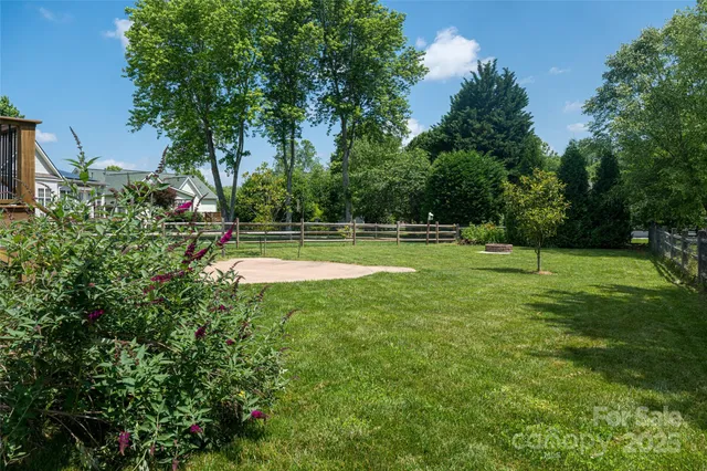 a view of a park with large trees