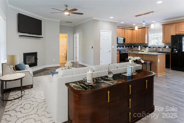 a kitchen with a stove a sink and a refrigerator