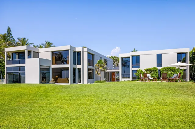 a outdoor view with a sitting space and garden view