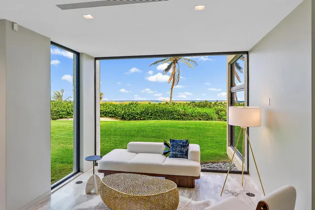 a dining room with a table and chairs