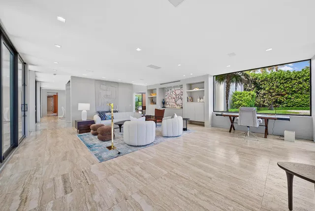 a kitchen with a large window and a sink