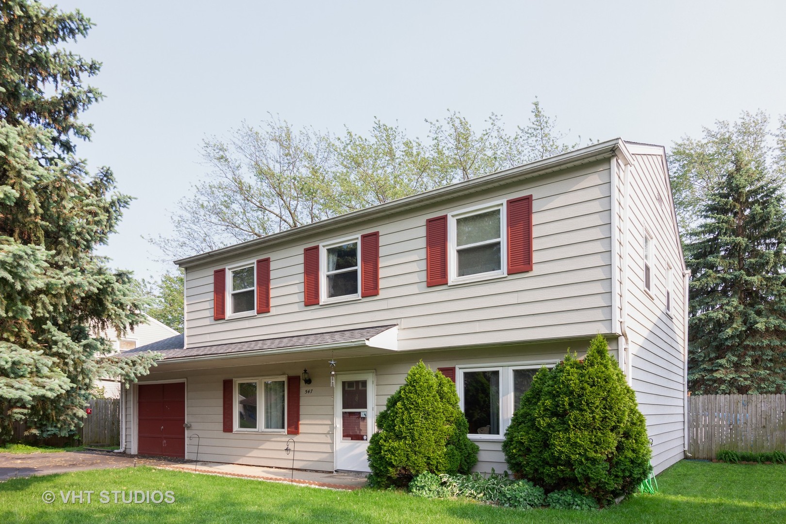 547 White Oak Road Bolingbrook, IL 60440 - Photo 1 of 19 a front view of a house with garden