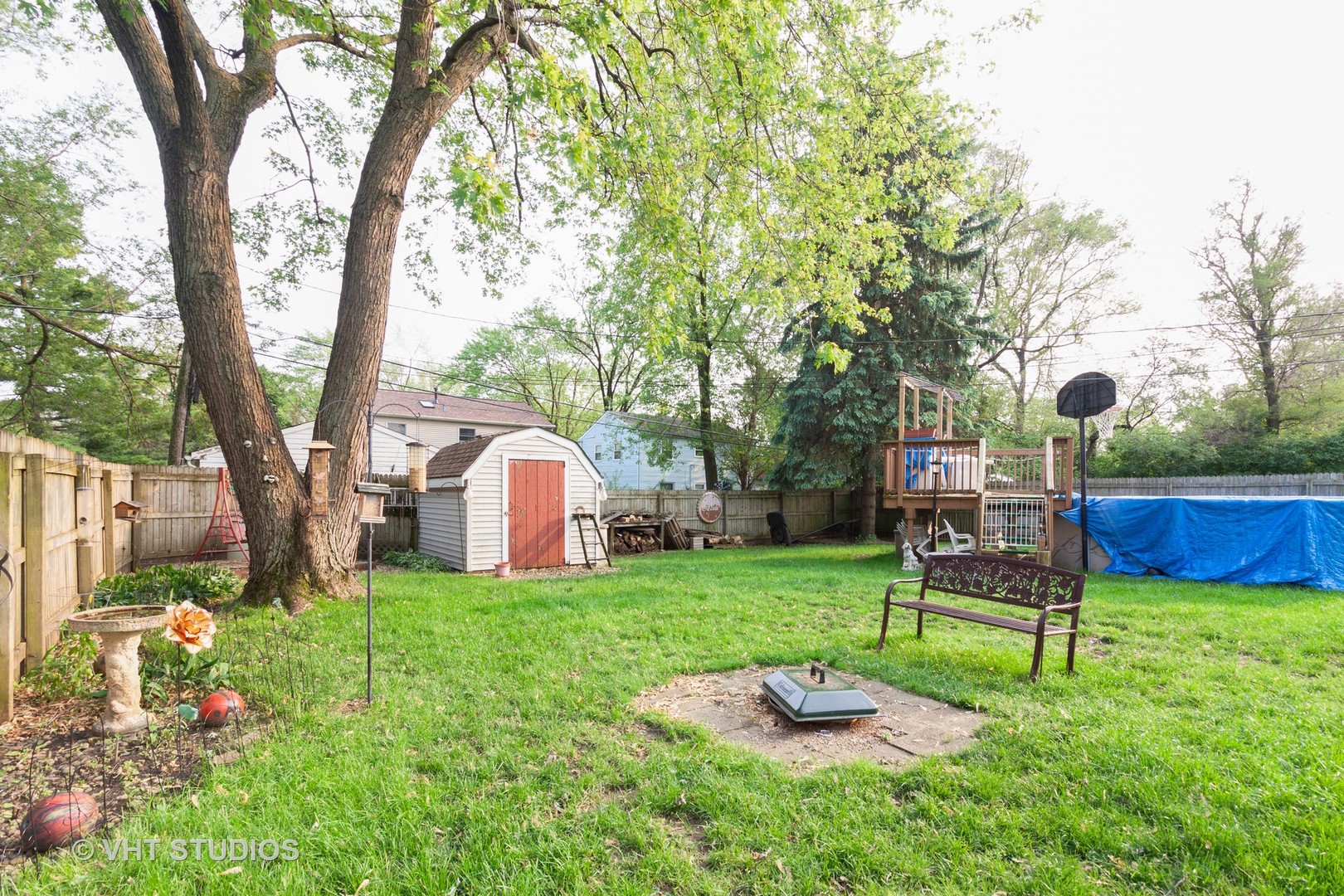 547 White Oak Road Bolingbrook, IL 60440 - Photo 19 of 19 a front view of a house with garden and trees