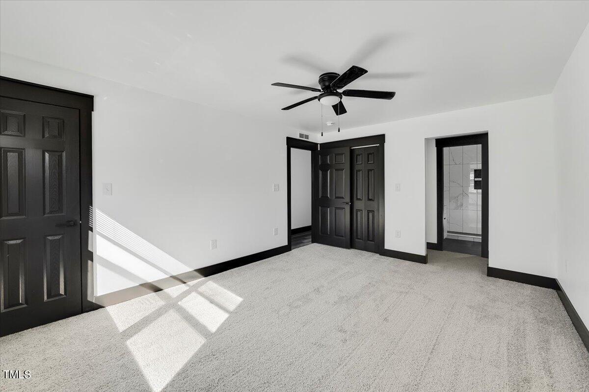 321 East Umstead Street Durham, NC 27707 - Photo 12 of 22 a view of room with a ceiling fan