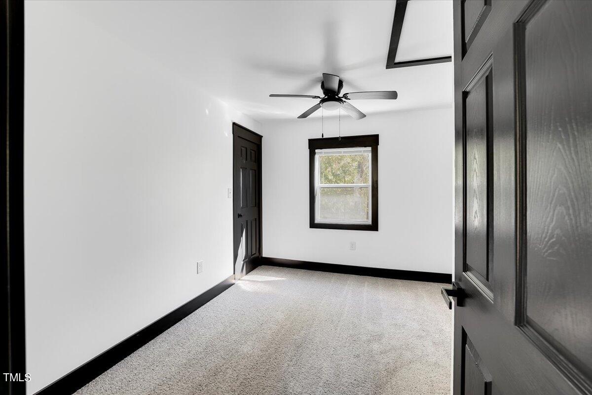 321 East Umstead Street Durham, NC 27707 - Photo 14 of 22 a view of an empty room with a window