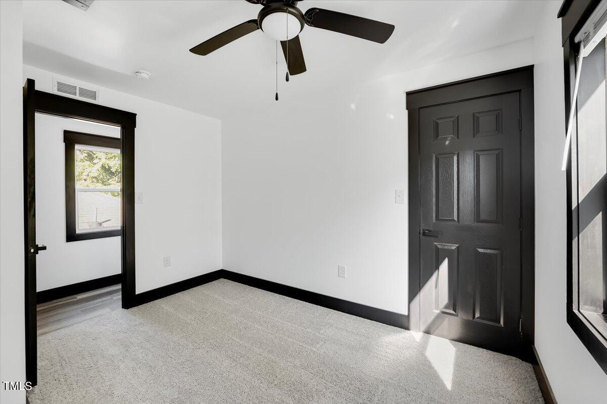 321 East Umstead Street Durham, NC 27707 - Photo 15 of 22 a view of a hallway with closet