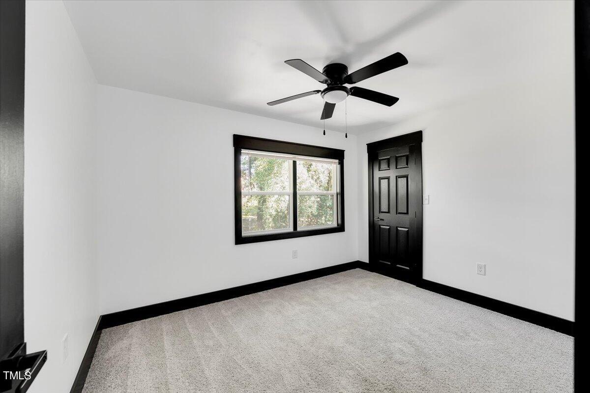 321 East Umstead Street Durham, NC 27707 - Photo 17 of 22 a view of an empty room with a window