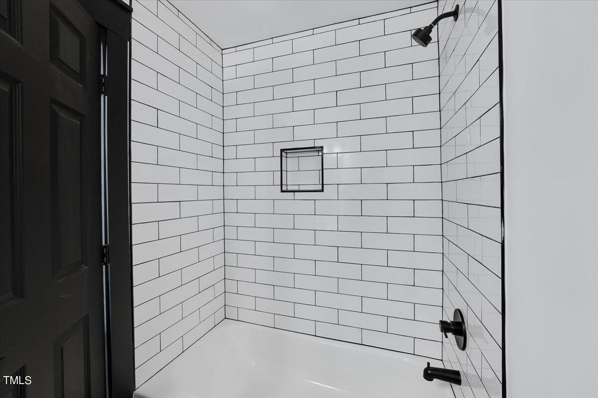 321 East Umstead Street Durham, NC 27707 - Photo 19 of 22 a bathroom with a bathtub