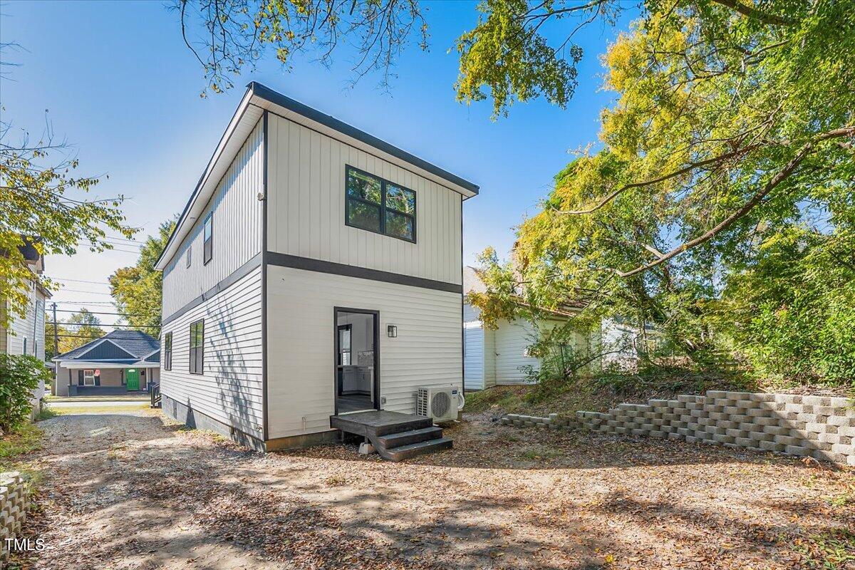 321 East Umstead Street Durham, NC 27707 - Photo 22 of 22 a view of a house with a yard