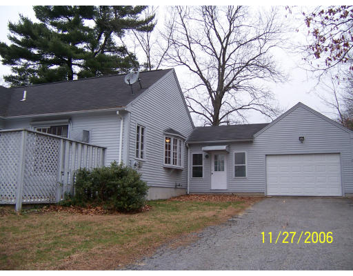 111 Brickyard Road, Unit B2 Athol, MA 01331 - Photo 1 of 1 a view of a white house with a large tree