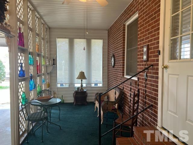71 Roberts Grove Road Dunn, NC 28334 - Photo 18 of 23 a balcony view with chairs and tables