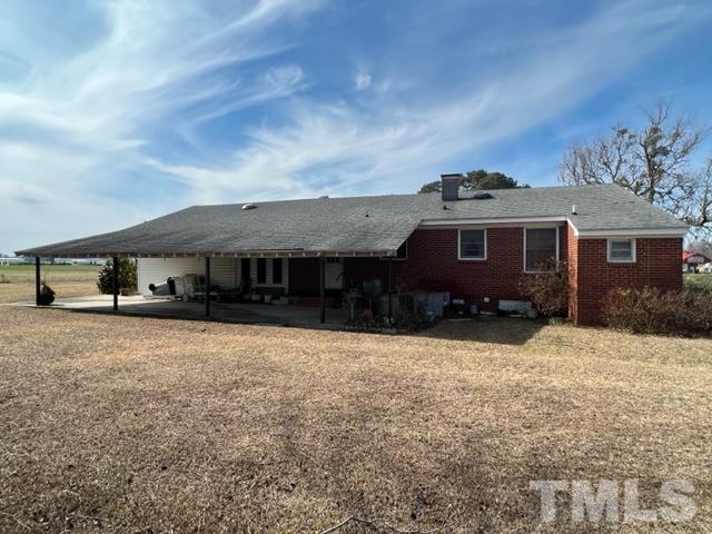 71 Roberts Grove Road Dunn, NC 28334 - Photo 23 of 23 a front view of a house with a yard