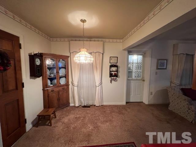 71 Roberts Grove Road Dunn, NC 28334 - Photo 7 of 23 a view of a livingroom with a furniture and closet
