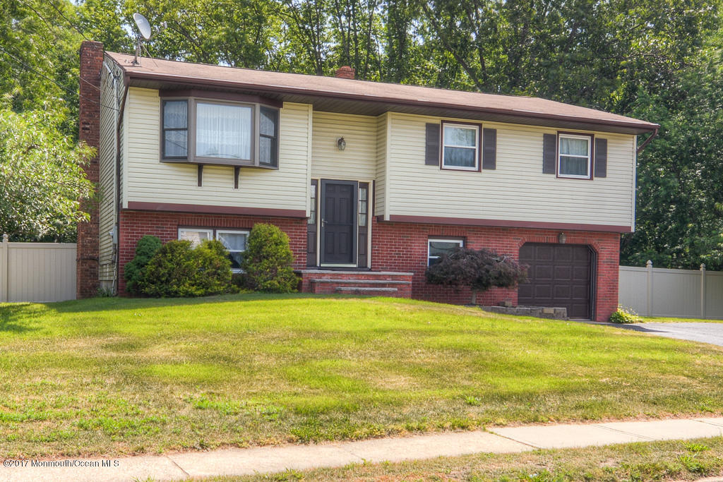 116 Newbury Road Howell, NJ 07731 - Photo 1 of 19 a view of a house with a yard