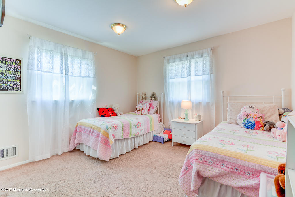 116 Newbury Road Howell, NJ 07731 - Photo 11 of 19 a bedroom with a bed and a window