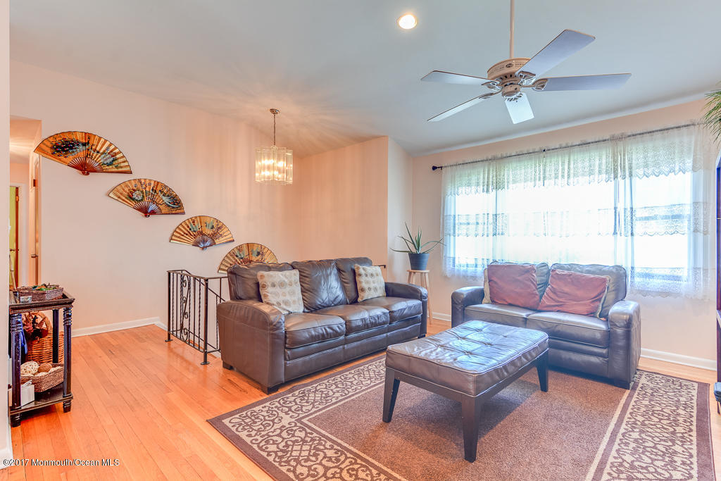 116 Newbury Road Howell, NJ 07731 - Photo 3 of 19 a living room with furniture and a large window
