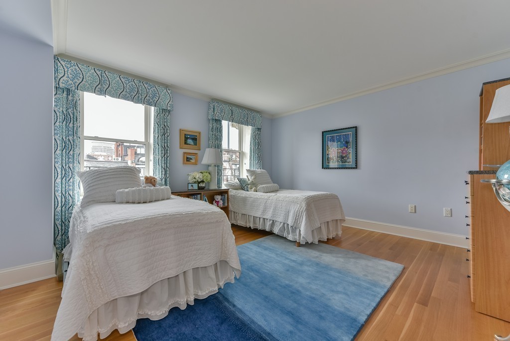 100 Beacon Street, Unit 7 Boston, MA 02116 - Photo 11 of 17 a bedroom with two beds and a night stand