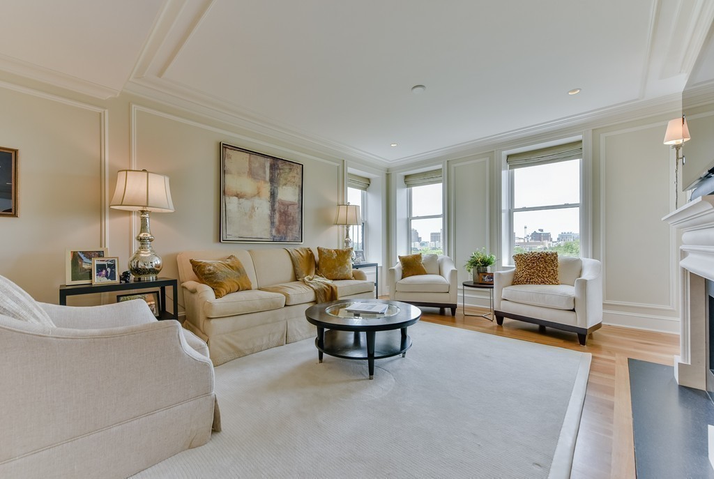 100 Beacon Street, Unit 7 Boston, MA 02116 - Photo 4 of 17 a living room with furniture and a large window