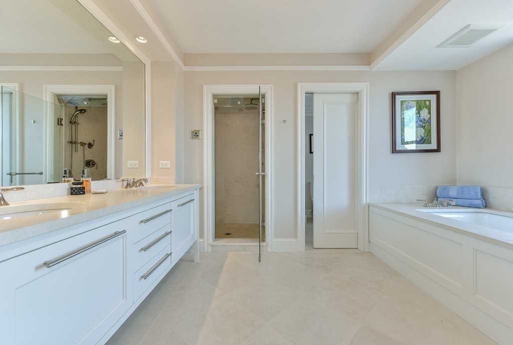 100 Beacon Street, Unit 7 Boston, MA 02116 - Photo 10 of 17 a spacious bathroom with a granite countertop sink a toilet a mirror and shower