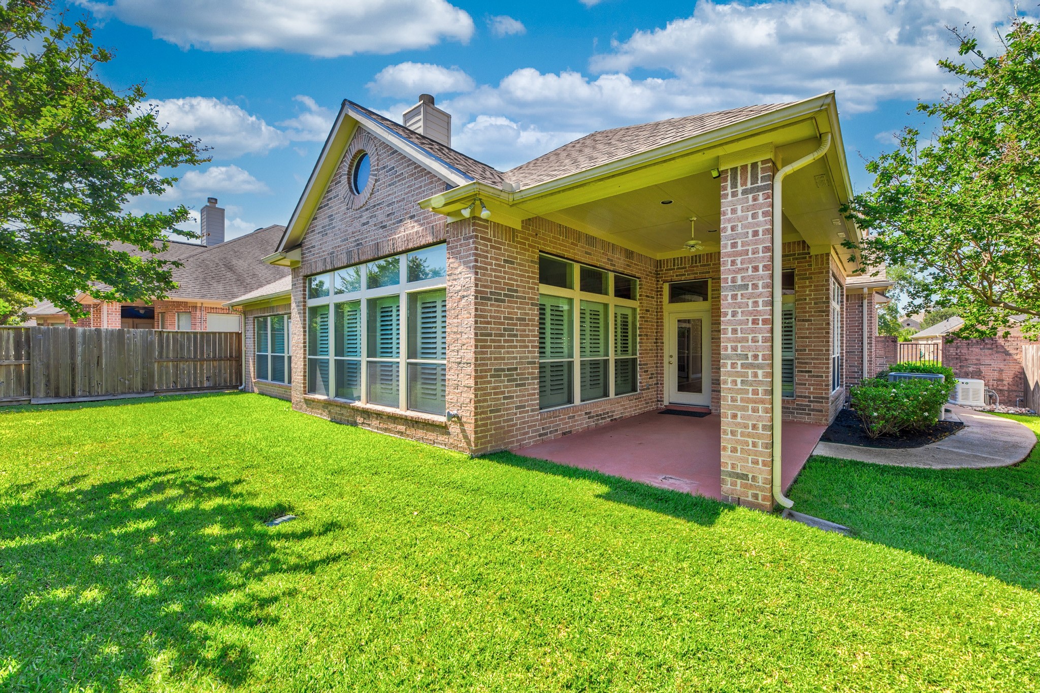 1222 Brinson Court Spring, TX 77379 - Photo 34 of 35 a view of a house with backyard and porch