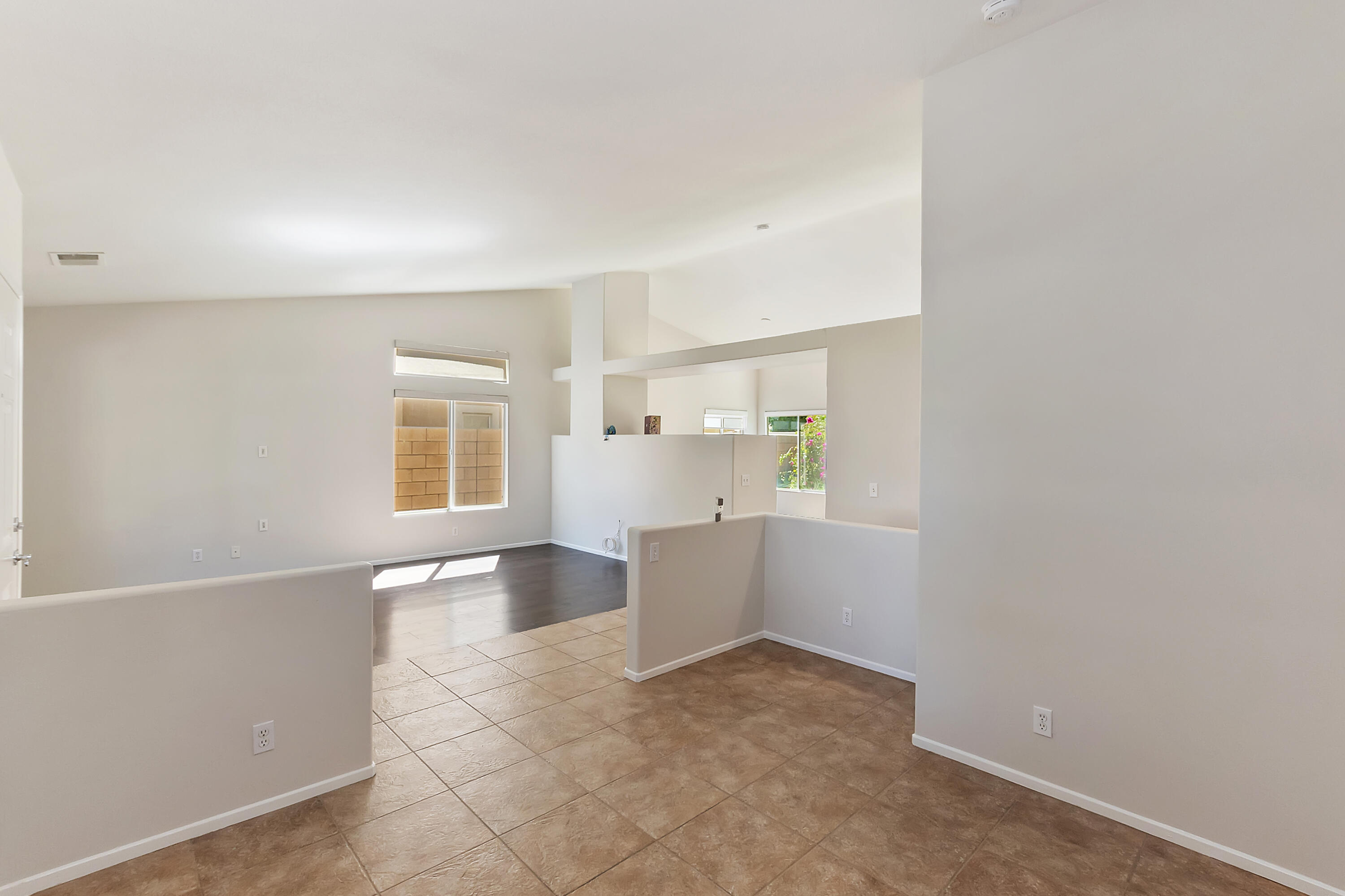 80669 Freedom Avenue Indio, CA 92201 - Photo 14 of 30 a view of a kitchen with wooden floor and windows