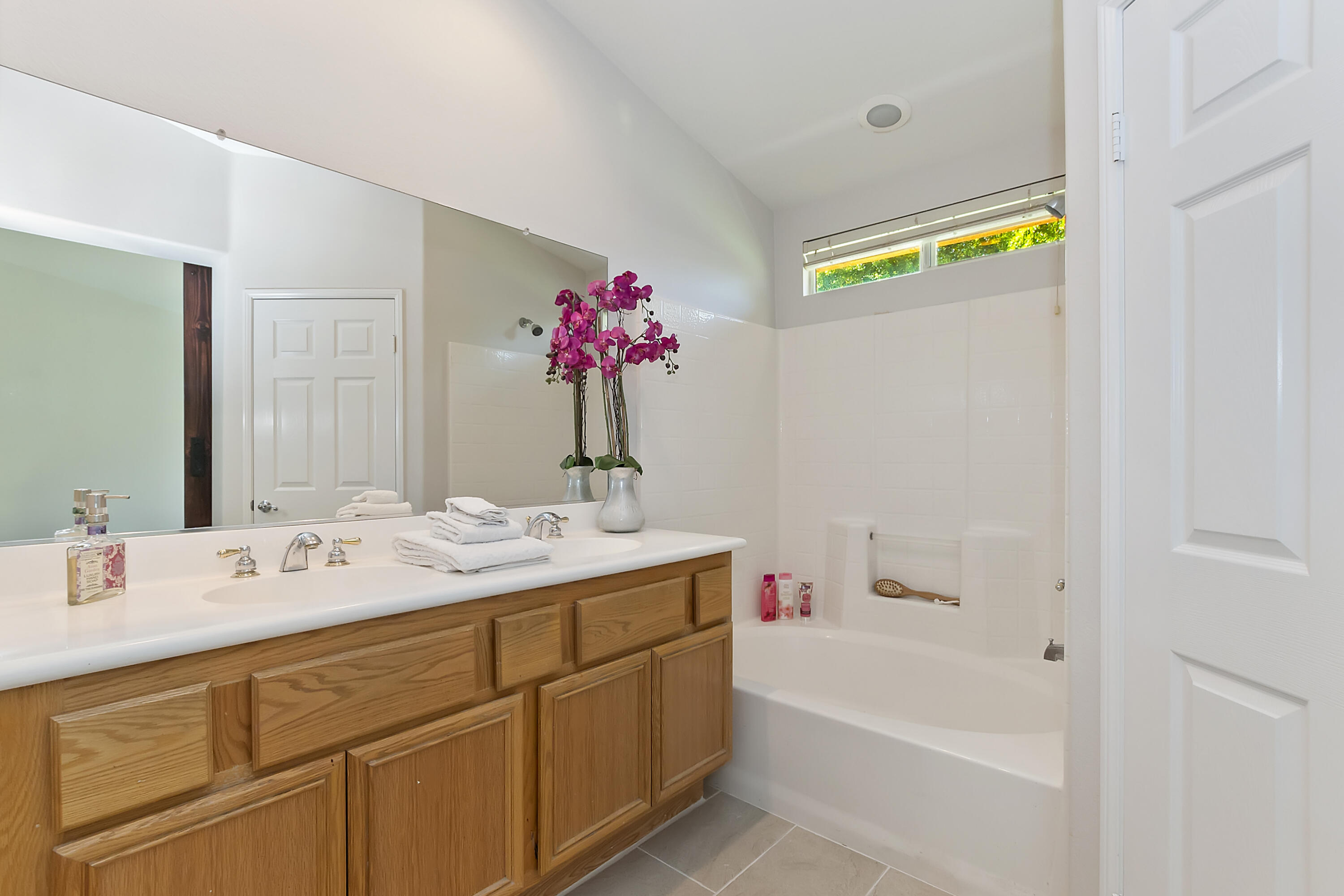 80669 Freedom Avenue Indio, CA 92201 - Photo 23 of 30 a bathroom with a tub sink and mirror