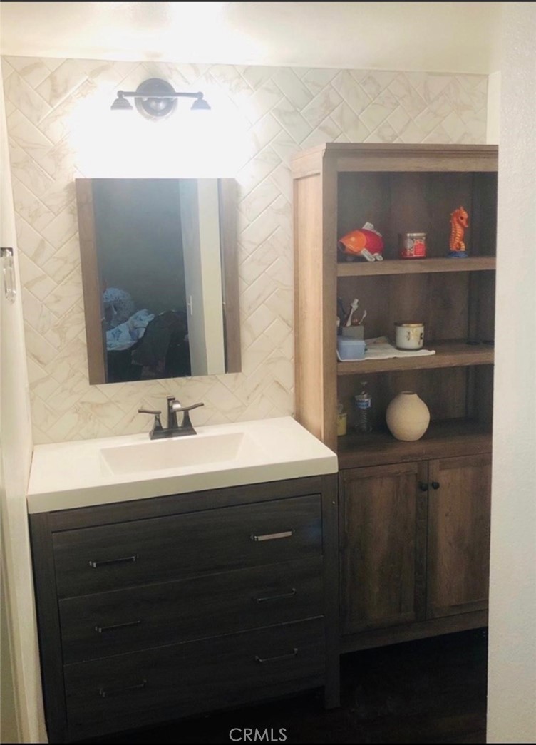 18223 Soledad Canyon Road, Unit 45 Canyon Country, CA 91387 - Photo 8 of 24 a bathroom with a sink and a mirror