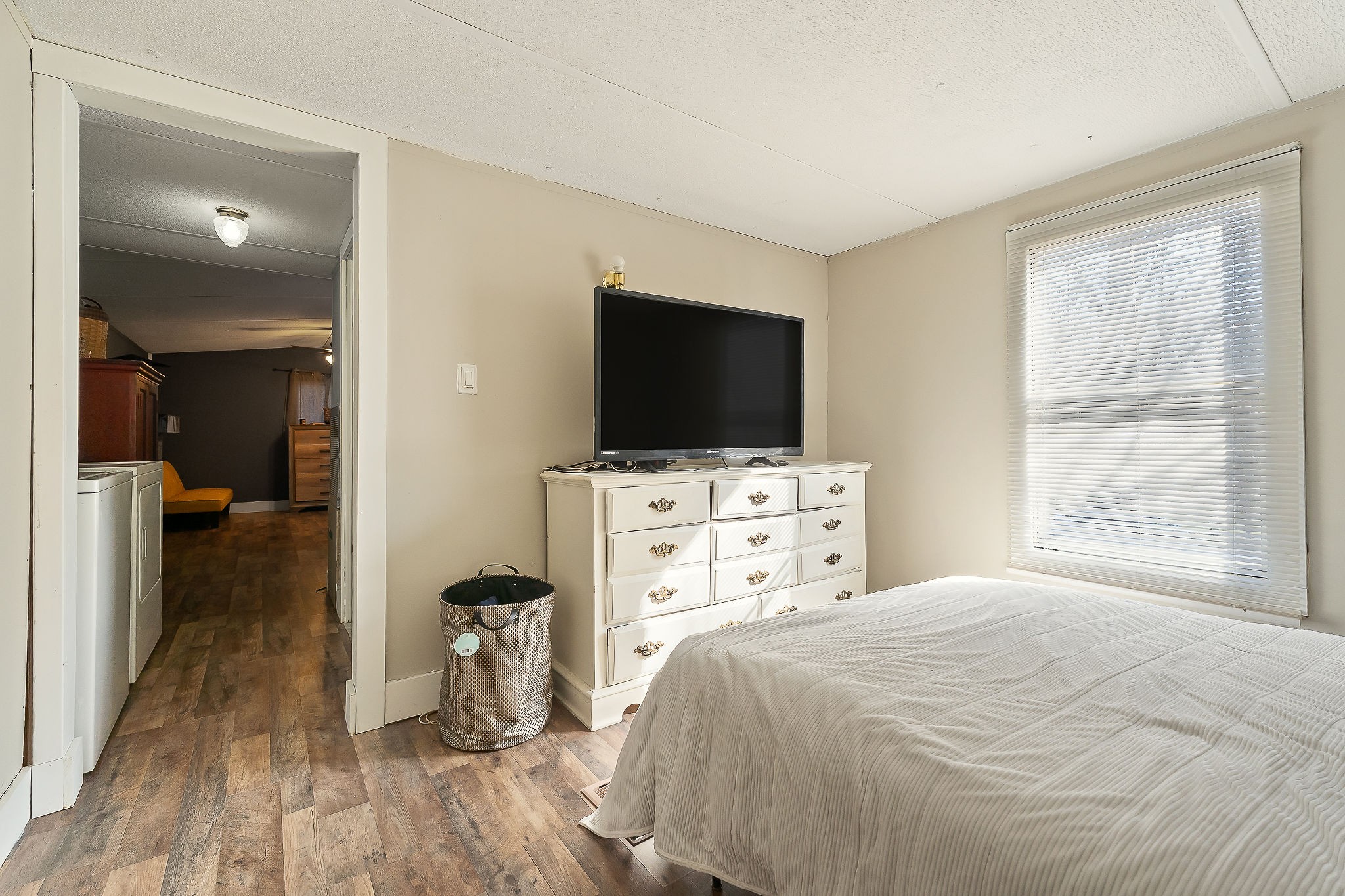 280 Bone Cave Road Rock Island, TN 38581 - Photo 11 of 27 a bedroom with a bed and a flat screen tv