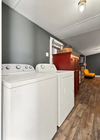 a building outdoor space with wooden furniture